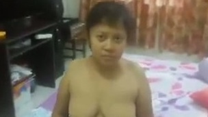 Indonesian shy mom showing bushy pussy in amateur clip